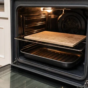 Oven preheating with a baking stone and empty broiler pan for ciabatta
