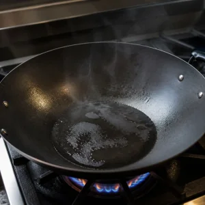 Oil shimmering in a hot wok ready for bulgogi