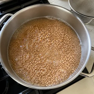 Farro simmering in a pot of water