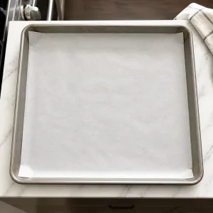 Rimmed baking sheet lined with parchment paper