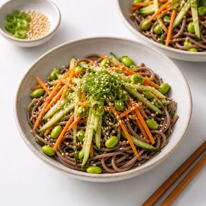Finished soba noodle salad with green onions and sesame seeds
