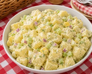 Potato salad folded with creamy dressing