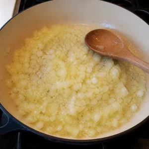 Chopped onion softening in butter
