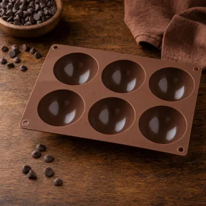 Dry silicone sphere mold ready for chocolate shells