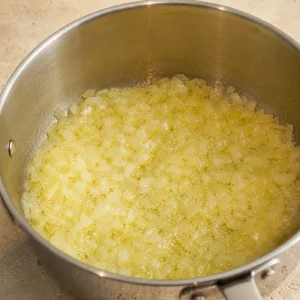 Chopped onion softening in butter and olive oil