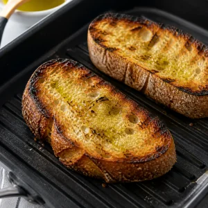 Thick slices of grilled bread toasted until golden