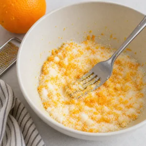 Orange zest rubbed into granulated sugar