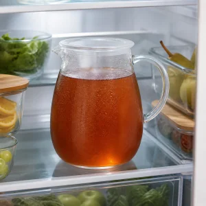 Pitcher of pear tea chilling in the refrigerator