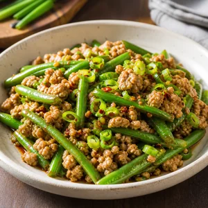 Poêlée de dinde au gingembre, ail et haricots verts